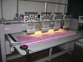 The ZSK embroidery machine makes embroidery on the blanks of women's t-shirts
