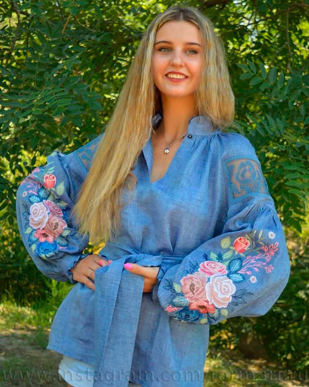 blue dress with embroidered roses
